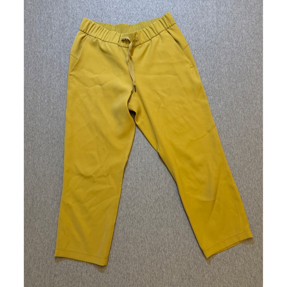 Lululemon On The Fly Crop Woven 23 Pants Women 6 Vintage Gold Yellow Drawstring